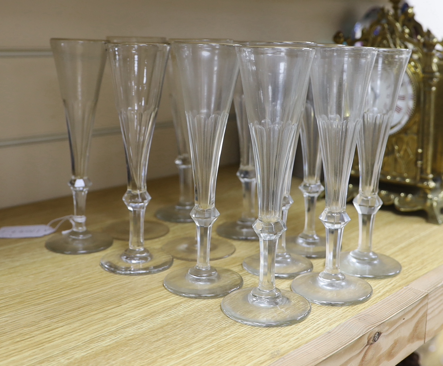 A set of ten 19th century champagne flutes and two others